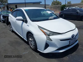 2016 Toyota Prius Two z VIN JTDKBRFU7G3518553, wystawiony jako IAAI lot #42427608 z przebiegiem 262 968 mil mil oraz . Historia ofert i sprzedaży dostępna na DreamBid. Obrazek 1.