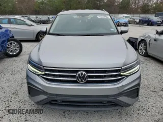 2023 Volkswagen Tiguan S with VIN 3VVRB7AX0PM107824, listed as a Copart auction lot 83444374 with 28,588 mi miles and Salvage title. Bid and sale history available at DreamBid. Image 5.