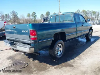 1996 Dodge Ram 1500 with VIN 3B7HF13Z8TG121571, listed as a IAAI auction lot 41759066 with 157,129 mi miles. Bid and sale history available at carsss.com. Image 4.
