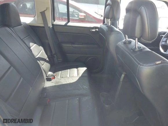 2016 Jeep Patriot Latitude with VIN 1C4NJRFBXGD673591, listed as a IAAI auction lot 41676827 with 114,632 mi miles. Bid and sale history available at carsss.com. Image 8.