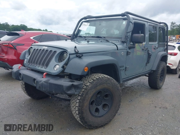 2015 Jeep Wrangler Unlimited Sport with VIN 1C4HJWDG1FL635620, listed as a IAAI auction lot 42396137 with 87,352 mi miles and . Bid and sale history available at DreamBid. Image 18.