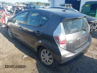 2014 Toyota Prius One with VIN JTDKDTB32E1564580, listed as a IAAI auction lot 41972541 with 186,673 mi miles and . Bid and sale history available at DreamBid. Image 3.