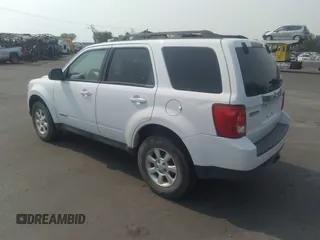 2008 Mazda Tribute Touring with VIN 4F2CZ96138KM32735, listed as a IAAI auction lot 31145122 with 206,608 mi miles and . Bid and sale history available at DreamBid. Image 3.