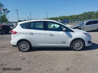 2017 Ford C-Max Energi Titanium with VIN 1FADP5FU9HL111926, listed as a IAAI auction lot 42065792 with 114,265 mi miles. Bid and sale history available at carsss.com. Image 13.