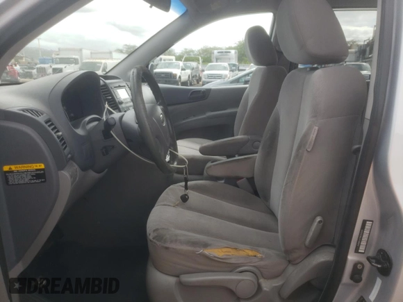 2009 Kia Sedona LX with VIN KNDMB233396300641, listed as a Copart auction lot 52036594 with 126,107 mi miles and Salvage Title. Bid and sale history available at carsss.com. Image 7.