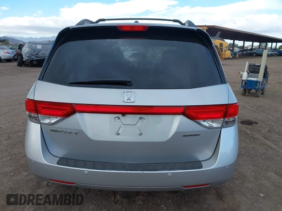 2014 Honda Odyssey Touring with VIN 5FNRL5H93EB066162, listed as a IAAI auction lot 41734783 with 173,063 mi miles and . Bid and sale history available at DreamBid. Image 16.