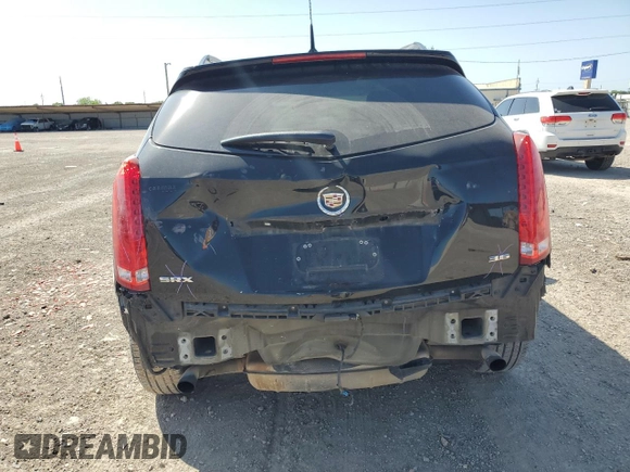 2013 Cadillac SRX Luxury Collection z VIN 3GYFNCE30DS646096, wystawiony jako Copart lot #51967015 z przebiegiem 225 516 mil mil oraz Szkoda całkowita • Salvage title. Historia ofert i sprzedaży dostępna na DreamBid. Obrazek 6.