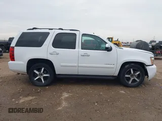 2007 Chevrolet Tahoe LT z VIN 1GNFK13017R359487, wystawiony jako IAAI lot #41744464 z przebiegiem 207 832 mil mil oraz . Historia ofert i sprzedaży dostępna na DreamBid. Obrazek 14.