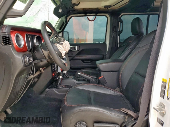 2023 Jeep Gladiator Rubicon with VIN 1C6JJTBG8PL532271, listed as a Copart auction lot 58220565 with 34,172 mi miles and Salvage title. Bid and sale history available at DreamBid. Image 7.