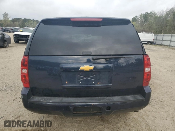 2014 Chevrolet Tahoe Commercial with VIN 1GNLC2E08ER209599, listed as a Copart auction lot 51018165 with 111,585 mi miles and Salvage title. Bid and sale history available at DreamBid. Image 6.