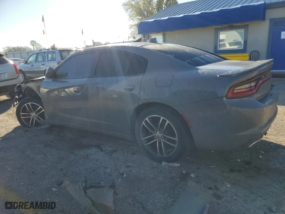 2019 Dodge Charger SXT with VIN 2C3CDXJG3KH615747, listed as a Copart auction lot 79638454 with 124,119 mi miles and Salvage Title. Bid and sale history available at carsss.com. Image 2.