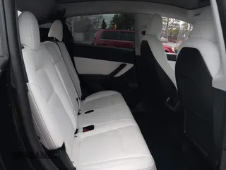 2022 Tesla Model Y Performance with VIN 7SAYGDEF7NF403701, listed as a IAAI auction lot 41961532 with 83,728 mi miles and . Bid and sale history available at DreamBid. Image 8.