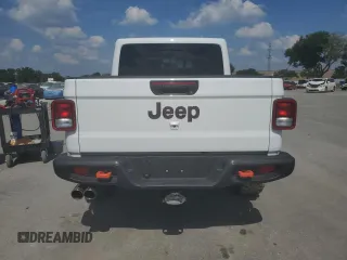 2023 Jeep Gladiator Mojave z VIN 1C6JJTEG7PL503422, wystawiony jako Copart lot #57415415 z przebiegiem 29 771 mil mil oraz Szkoda całkowita • Salvage title. Historia ofert i sprzedaży dostępna na DreamBid. Obrazek 6.