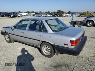 1991 Toyota Camry z VIN 4T1SV24E1MU369875, wystawiony jako Copart lot #79859504 z przebiegiem 138 718 mil mil oraz Szkoda całkowita • Salvage title. Historia ofert i sprzedaży dostępna na DreamBid. Obrazek 2.