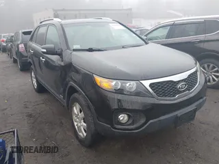 2011 Kia Sorento LX with VIN 5XYKTCA14BG141563, listed as a IAAI auction lot 41881854 with 119,286 mi miles and . Bid and sale history available at DreamBid. Image 1.