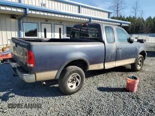 1999 Ford F-150 with VIN 1FTRX18W0XNC03906, listed as a Copart auction lot 42742555 with Not provided miles and Salvage title. Bid and sale history available at DreamBid. Image 3.