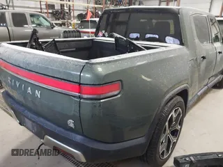 2022 Rivian R1T Adventure Package with VIN 7FCTGAAA0NN004365, listed as a IAAI auction lot 41534730 with 1 mi miles. Bid and sale history available at carsss.com. Image 4.