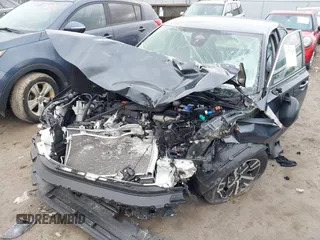 2024 Honda Civic LX z VIN 19XFL2H5XRE023870, wystawiony jako IAAI lot #41776260 z przebiegiem Nie podano mil oraz . Historia ofert i sprzedaży dostępna na DreamBid. Obrazek 6.