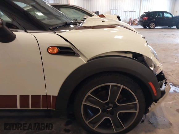 2013 MINI Roadster with VIN WMWSY1C52DT625564, listed as a IAAI auction lot 41442864 with 98,240 mi miles and . Bid and sale history available at DreamBid. Image 19.