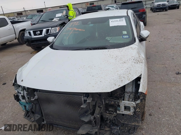 2020 Honda Civic LX with VIN 19XFC2F62LE021811, listed as a IAAI auction lot 41591466 with 75,797 mi miles and . Bid and sale history available at DreamBid. Image 6.