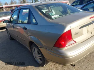 2001 Ford Focus SE with VIN 1FAFP34P71W313484, listed as a IAAI auction lot 41740406 with 141,385 mi miles and . Bid and sale history available at carsss.com. Image 3.