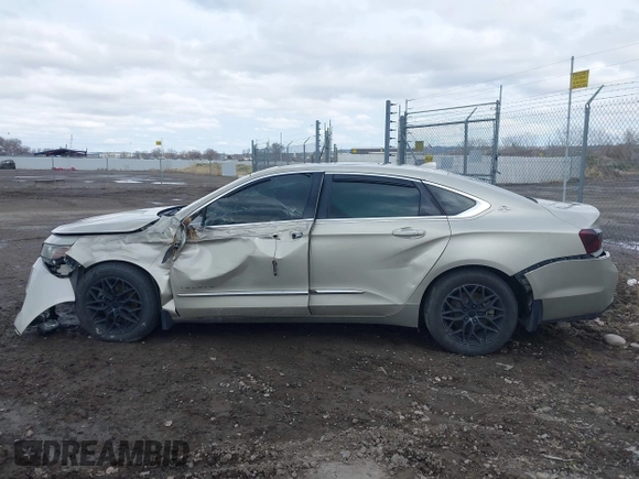2014 Chevrolet Impala LTZ with VIN 2G1155S39E9278301, listed as a IAAI auction lot 41165311 with 147,034 mi miles and . Bid and sale history available at DreamBid. Image 14.