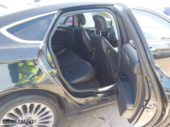 2014 Ford Fusion Titanium Hybrid with VIN 3FA6P0RU9ER111834, listed as a IAAI auction lot 41570337 with 121,099 mi miles. Bid and sale history available at carsss.com. Image 8.