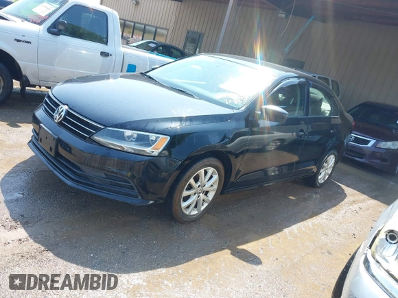 2015 Volkswagen Jetta Sedan 1.8T SE with VIN 3VWD17AJ6FM285921, listed as a IAAI auction lot 42005164 with 173,028 mi miles. Bid and sale history available at carsss.com. Image 2.
