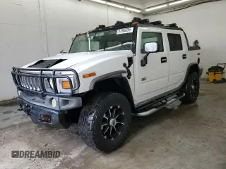 2005 Hummer H2 SUT with VIN 5GRGN22U15H123731, listed as a Copart auction lot 87680395 with 205,043 mi miles and Salvage Title. Bid and sale history available at carsss.com. Image 1.