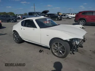 2023 Mazda MX-5 Miata Grand Touring with VIN JM1NDAM76P0561207, listed as a Copart auction lot 72202434 with 6,928 mi miles and Salvage title. Bid and sale history available at DreamBid. Image 4.