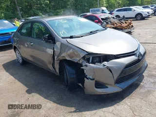 2019 Toyota Corolla L z VIN 2T1BURHE1KC171012, wystawiony jako IAAI lot #42254086 z przebiegiem 70 832 mil mil oraz . Historia ofert i sprzedaży dostępna na DreamBid. Obrazek 1.