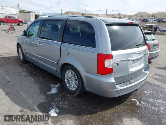 2013 Chrysler Town & Country Limited with VIN 2C4RC1GGXDR548106, listed as a IAAI auction lot 41890220 with 189,908 mi miles. Bid and sale history available at carsss.com. Image 3.