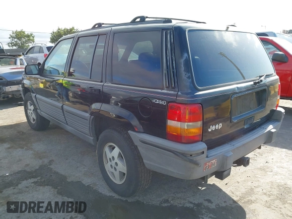 1995 Jeep Grand Cherokee Laredo z VIN 1J4GZ58S9SC553345, wystawiony jako IAAI lot #42772979 z przebiegiem 216 808 mil mil oraz . Historia ofert i sprzedaży dostępna na DreamBid. Obrazek 3.