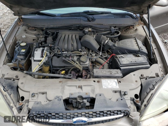 2003 Ford Taurus SES Standard z VIN 1FAFP55U33A123732, wystawiony jako Copart lot #58837395 z przebiegiem 169 159 mil mil oraz Szkoda całkowita • Salvage title. Historia ofert i sprzedaży dostępna na DreamBid. Obrazek 11.