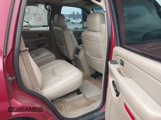 2004 GMC Yukon SLT with VIN 1GKEC13Z54R180532, listed as a IAAI auction lot 41695583 with 231,868 mi miles. Bid and sale history available at carsss.com. Image 8.