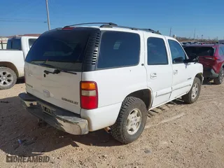 2003 Chevrolet Tahoe LS with VIN 1GNEC13Z43R282194, listed as a IAAI auction lot 41363024 with 207,135 mi miles. Bid and sale history available at carsss.com. Image 4.