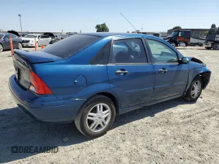 2000 Ford Focus SE z VIN 1FAFP3434YW410889, wystawiony jako Copart lot #59210555 z przebiegiem 160 170 mil mil oraz Szkoda całkowita • Salvage title. Historia ofert i sprzedaży dostępna na DreamBid. Obrazek 3.