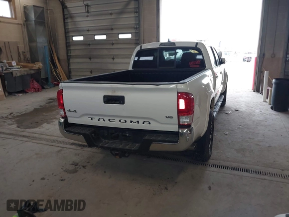 2016 Toyota Tacoma SR5 with VIN 3TMDZ5BN2GM007990, listed as a IAAI auction lot 41288736 with 76,179 mi miles. Bid and sale history available at carsss.com. Image 16.