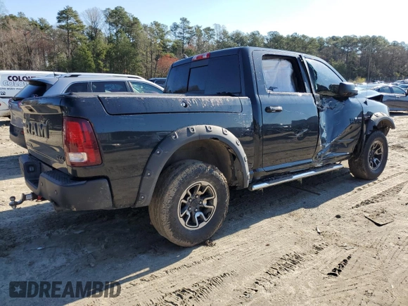2015 Ram 1500 Rebel z VIN 1C6RR7YT7FS771791, wystawiony jako Copart lot #49873094 z przebiegiem 119 875 mil mil oraz Szkoda całkowita • Salvage title. Historia ofert i sprzedaży dostępna na DreamBid. Obrazek 3.