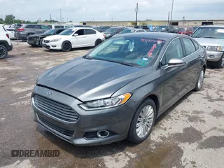2013 Ford Fusion SE Hybrid with VIN 3FA6P0LU9DR247484, listed as a IAAI auction lot 42110685 with 202,531 mi miles. Bid and sale history available at carsss.com. Image 2.