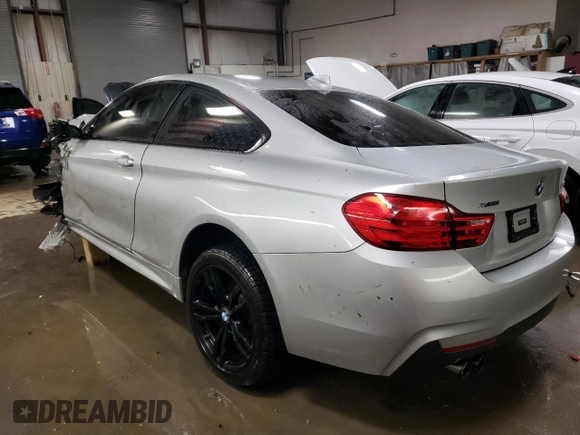 2014 BMW 4 Series 428i xDrive with VIN WBA3N5C50EK196422, listed as a Copart auction lot 82368874 with 68,079 mi miles and Salvage Title. Bid and sale history available at DreamBid. Image 2.