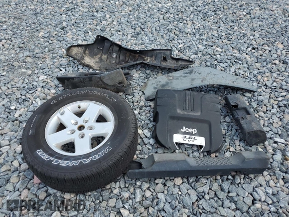 2012 Jeep Wrangler Unlimited Sport with VIN 1C4BJWDG6CL240673, listed as a Copart auction lot 60669625 with Not provided miles and Salvage title. Bid and sale history available at DreamBid. Image 12.