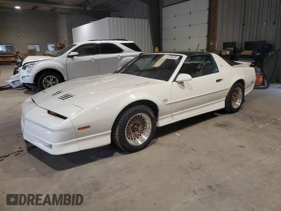 1989 Pontiac Firebird z VIN 1G2FW2180KL256119, wystawiony jako Copart lot #56474875 z przebiegiem 81 176 mil mil oraz Szkoda całkowita • Salvage title. Historia ofert i sprzedaży dostępna na DreamBid. Obrazek 1.
