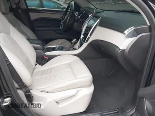 2015 Cadillac SRX with VIN 3GYFNAE37FS598023, listed as a IAAI auction lot 41198546 with 127,373 mi miles and . Bid and sale history available at carsss.com. Image 5.