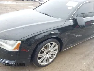 2014 Audi A8 3.0T z VIN WAURGAFD5EN004118, wystawiony jako IAAI lot #41919506 z przebiegiem 182 382 mil mil oraz . Historia ofert i sprzedaży dostępna na DreamBid. Obrazek 6.