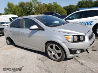 2014 Chevrolet Sonic LTZ with VIN 1G1JE5SB6E4215697, listed as a Copart auction lot 70820024 with 166,414 mi miles and Salvage Title. Bid and sale history available at carsss.com. Image 4.