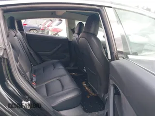 2018 Tesla Model 3 Long Range Battery z VIN 5YJ3E1EB3JF127410, wystawiony jako IAAI lot #41994858 z przebiegiem 100 494 mil mil oraz . Historia ofert i sprzedaży dostępna na DreamBid. Obrazek 8.