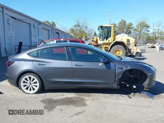2022 Tesla Model 3 Long Range with VIN 5YJ3E1EB3NF290550, listed as a IAAI auction lot 41826287 with 67,648 mi miles and . Bid and sale history available at DreamBid. Image 14.