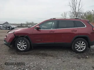 2015 Jeep Cherokee Limited with VIN 1C4PJMDSXFW604627, listed as a IAAI auction lot 42072953 with 102,501 mi miles and . Bid and sale history available at DreamBid. Image 14.