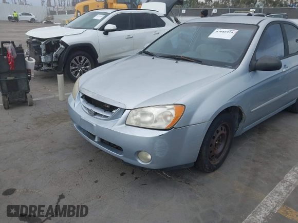 2005 Kia Spectra LX with VIN KNAFE121755142490, listed as a IAAI auction lot 42085928 with 170,406 mi miles. Bid and sale history available at carsss.com. Image 6.